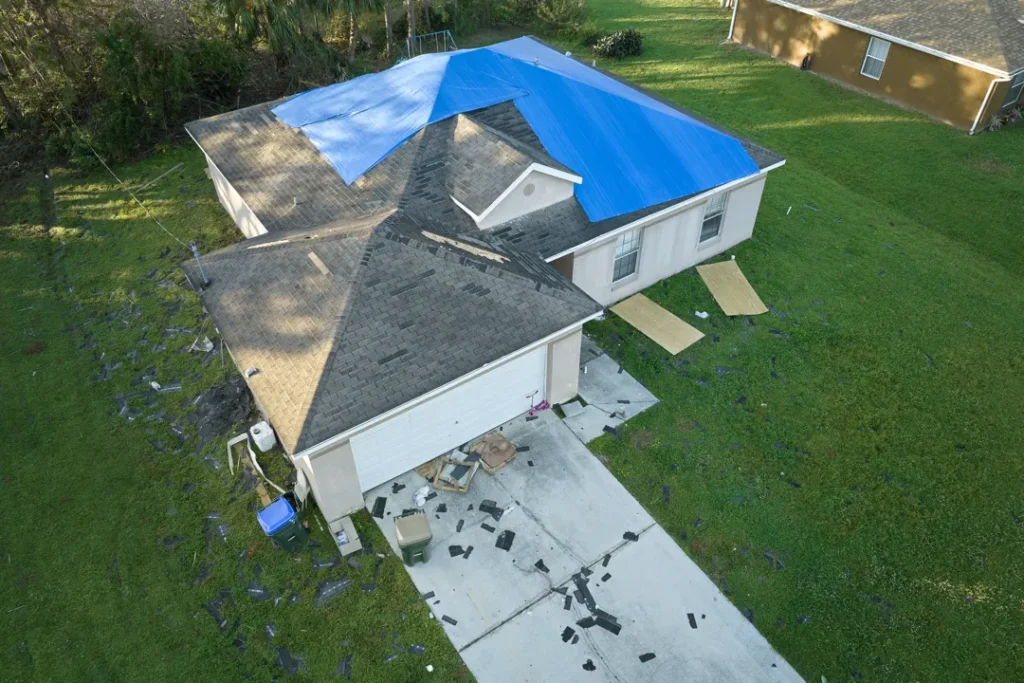 tarp on leaky house roof from louisiana storm