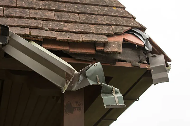 home gutter damage from louisiana storm