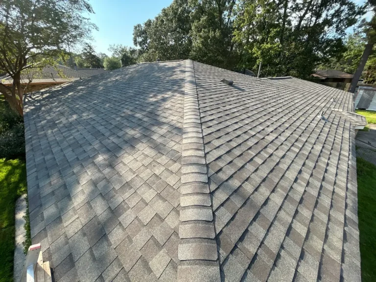 Finished CertainTeed Landmark shingle roof with hip and ridge cap on a Baker, LA home