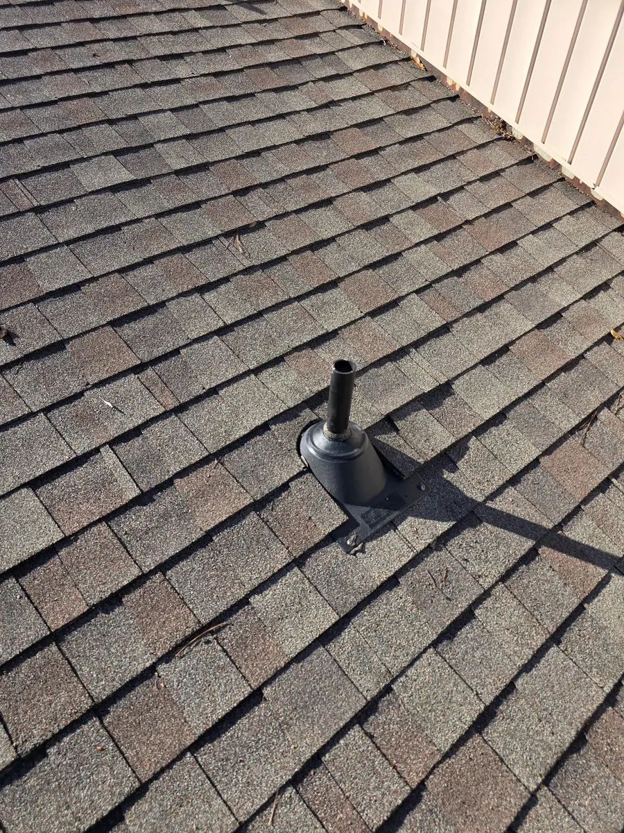 New pipe flashing installed around a vent pipe on a Baker, LA roof