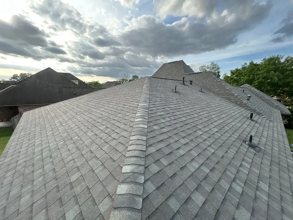 Completed CertainTeed Landmark roof with new hip and ridge caps and pipe flashings on the Saint Gabriel, Louisiana home
