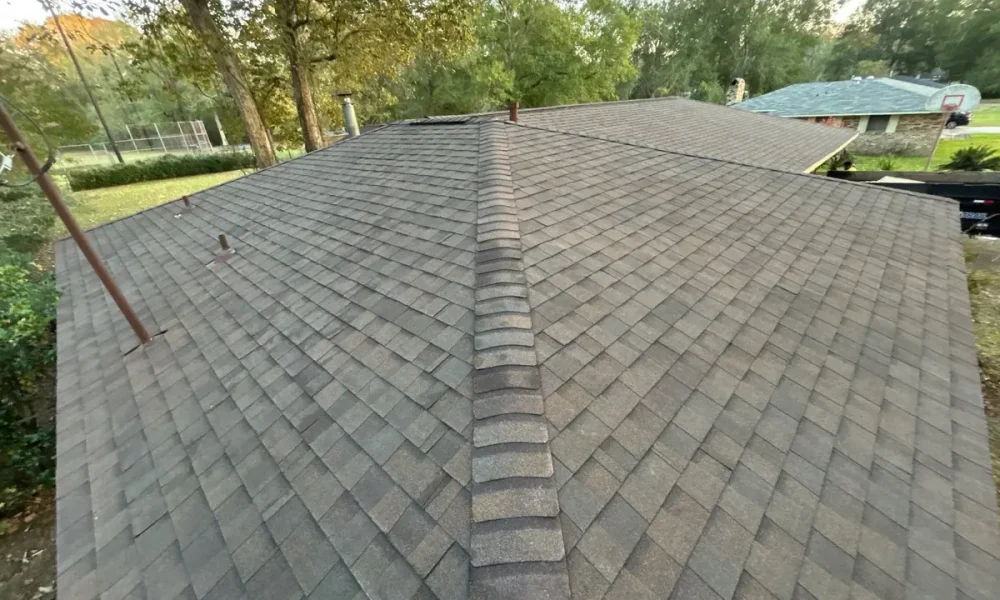 Ridge cap on a new architectural shingle roof in Baker, Louisiana