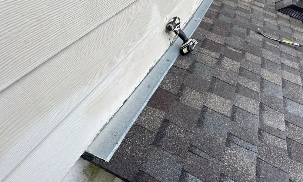 New shingles meeting fascia and gutter on a Zachary, Louisiana roof