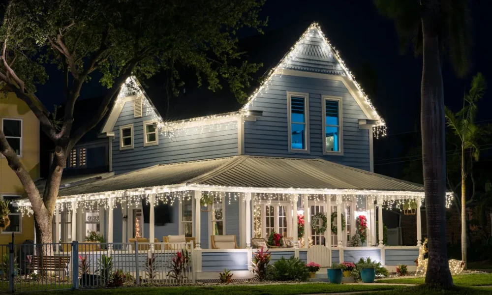 house front yard bright christmas lights porch