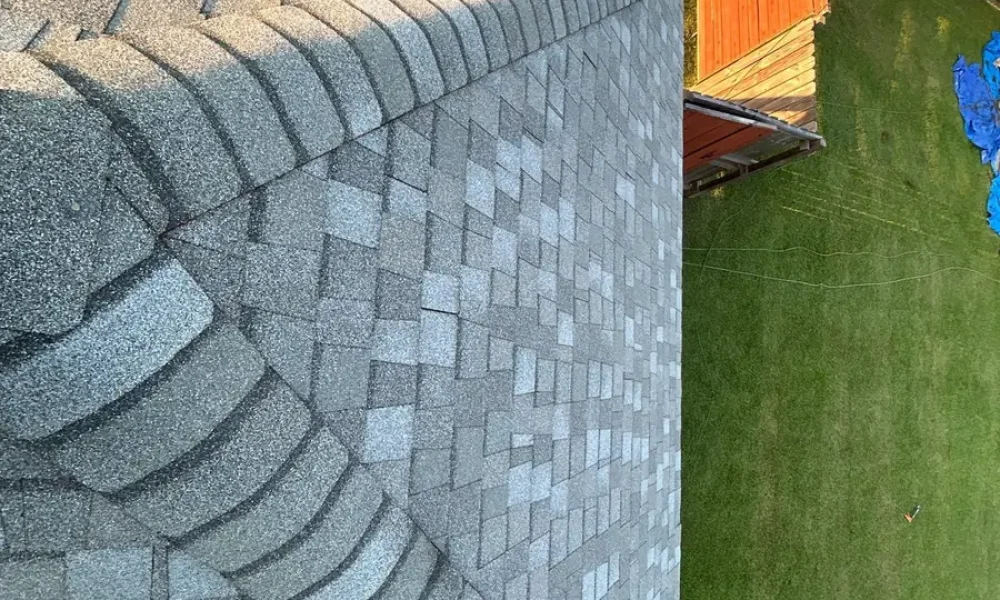 Overhead view of a finished hip capped with CertainTeed Shadow Ridge hip and ridge shingles