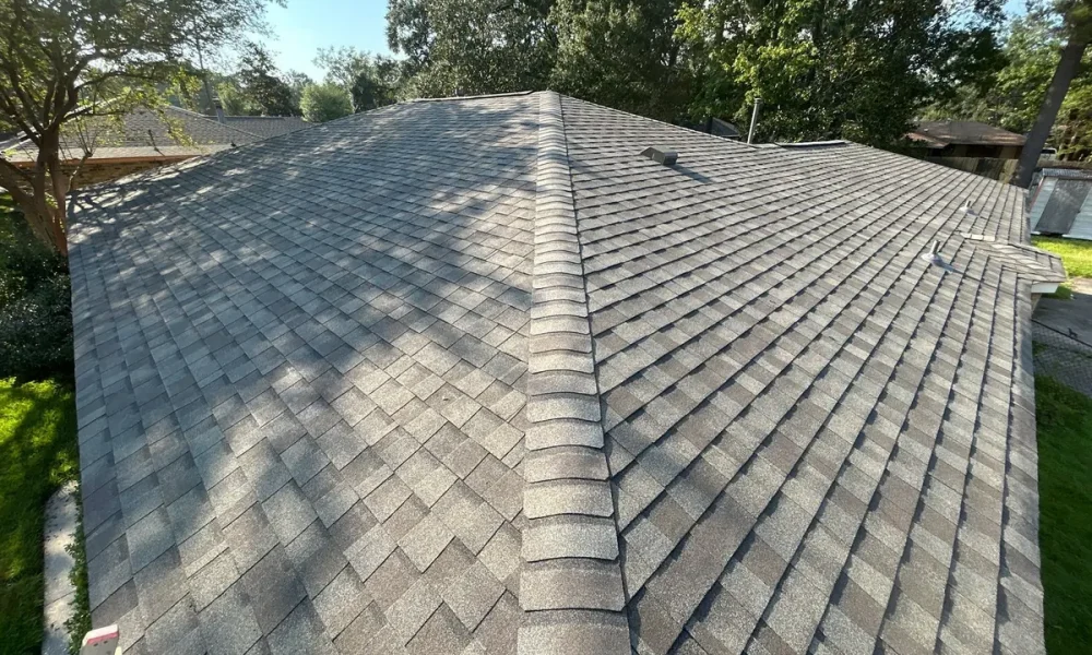 Finished CertainTeed Landmark shingle roof with hip and ridge cap on a Baker, LA home