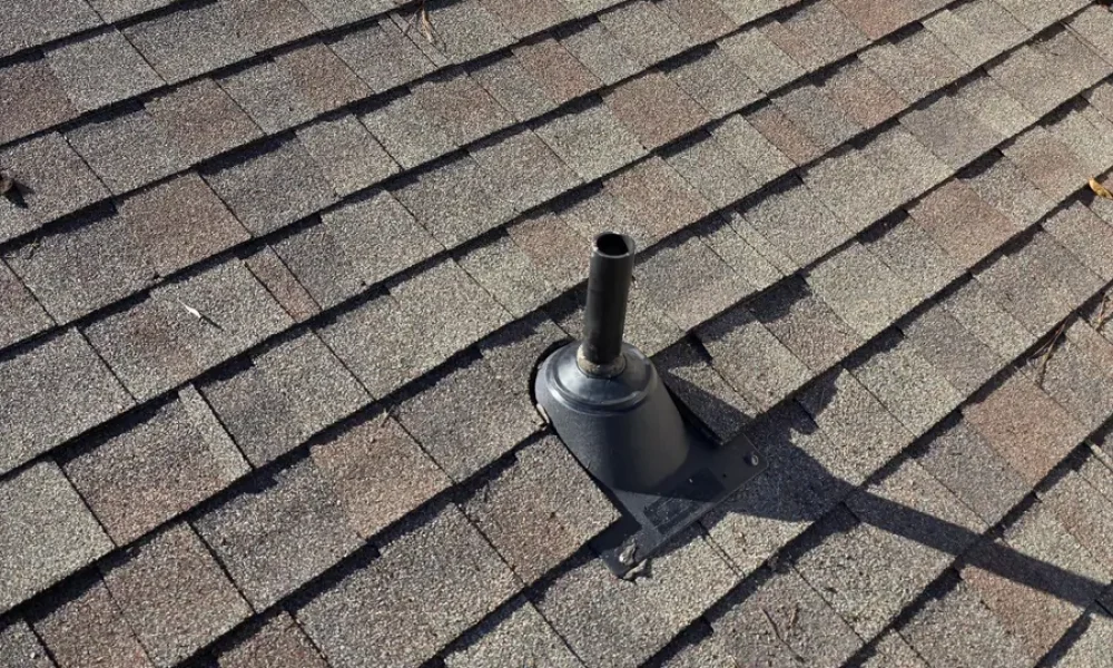 New pipe flashing installed around a vent pipe on a Baker, LA roof