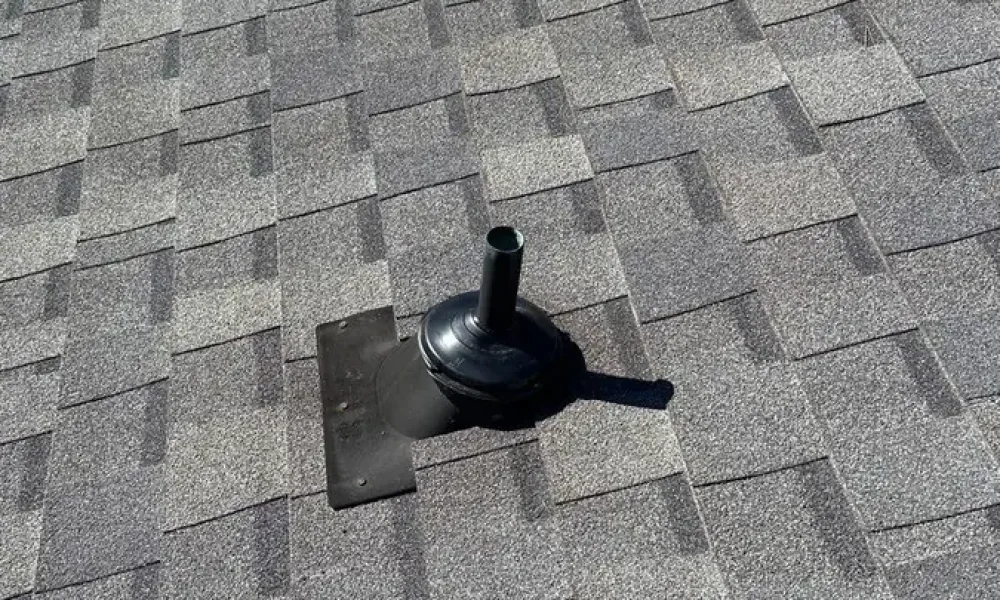 Pipe boot flashed into the shingle field after a roof repair in Greenwell Springs, LA