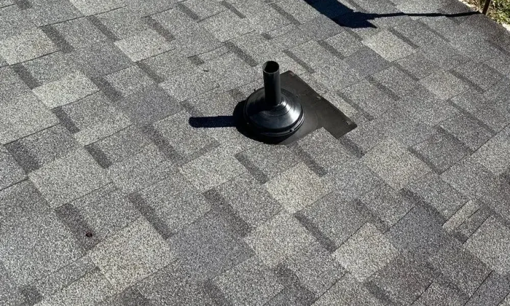 Pipe boot near the eave of a shingle roof in Greenwell Springs, LA after a Roof Rescue repair visit