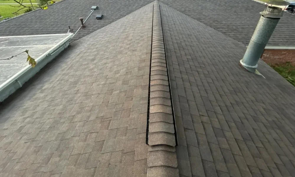 Ridge vent and ridge cap on a new CertainTeed Landmark shingle roof in Baker, Louisiana