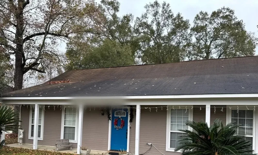 Central, Louisiana home with its original aging shingle roof before replacement by Roof Rescue