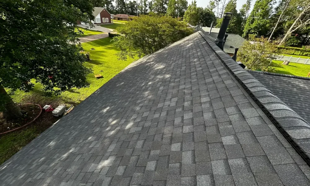 New architectural shingles running along the main ridge of a Greenwell Springs, LA home after the Roof Rescue replacement