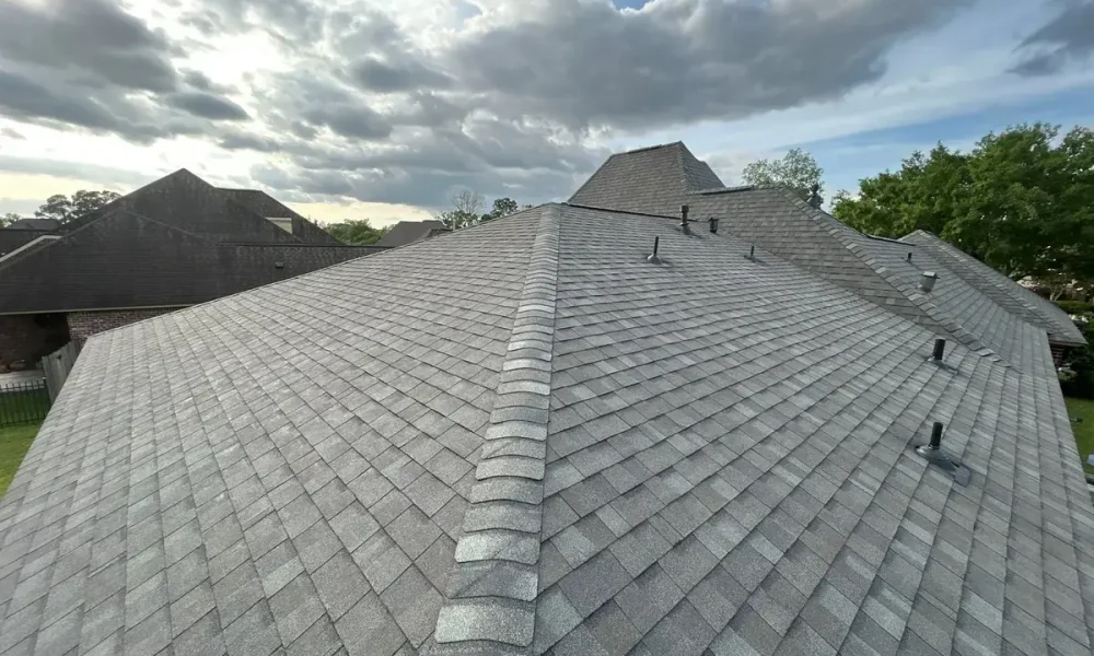 Completed CertainTeed Landmark roof with new hip and ridge caps and pipe flashings on the Saint Gabriel, Louisiana home