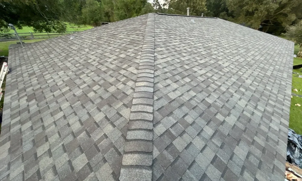 Completed CertainTeed Landmark roof in Weathered Wood showing the finished hip and ridge cap