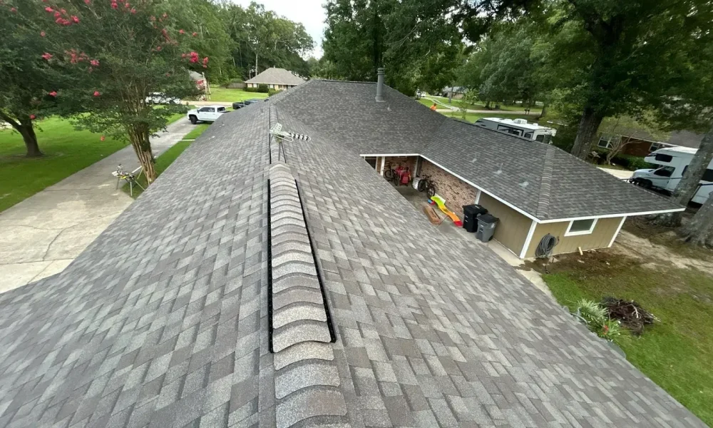 Finished architectural shingle roof with ridge vent on a Zachary, Louisiana home, installed by Roof Rescue LLC